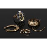 A quantity of scrap 9ct gold including a blue stone set ring, gross weight 7.7 grams.