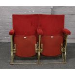 A pair of Art Deco folding theatre / cinema seats one with decorative end panel.