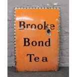 A vintage Brooke Bond tea enamel advertising sign, c.1940. 74cm x 50cm.