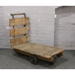A late 19th / early 20th century wooden industrial trolley.