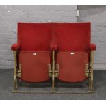 A pair of folding theatre / cinema seats.