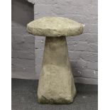 A reproduction decorative cast concrete staddle stone.