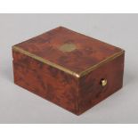 An early 19th century small amboyna wood box with hinged cover and brass edgings, 8.75cm.