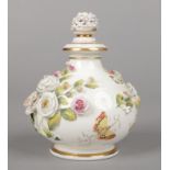 A large Rockingham bulbous scent bottle with ridged shoulder and flared neck. Embellished with
