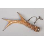 A white metal mounted antler vinaigrette, 20cm.Condition report intended as a guide only.Hinge of