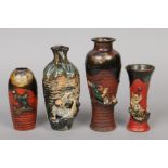 Four Japanese Sumida Gawa vases one with pleated neck. Decorated with drip glazes and with applied