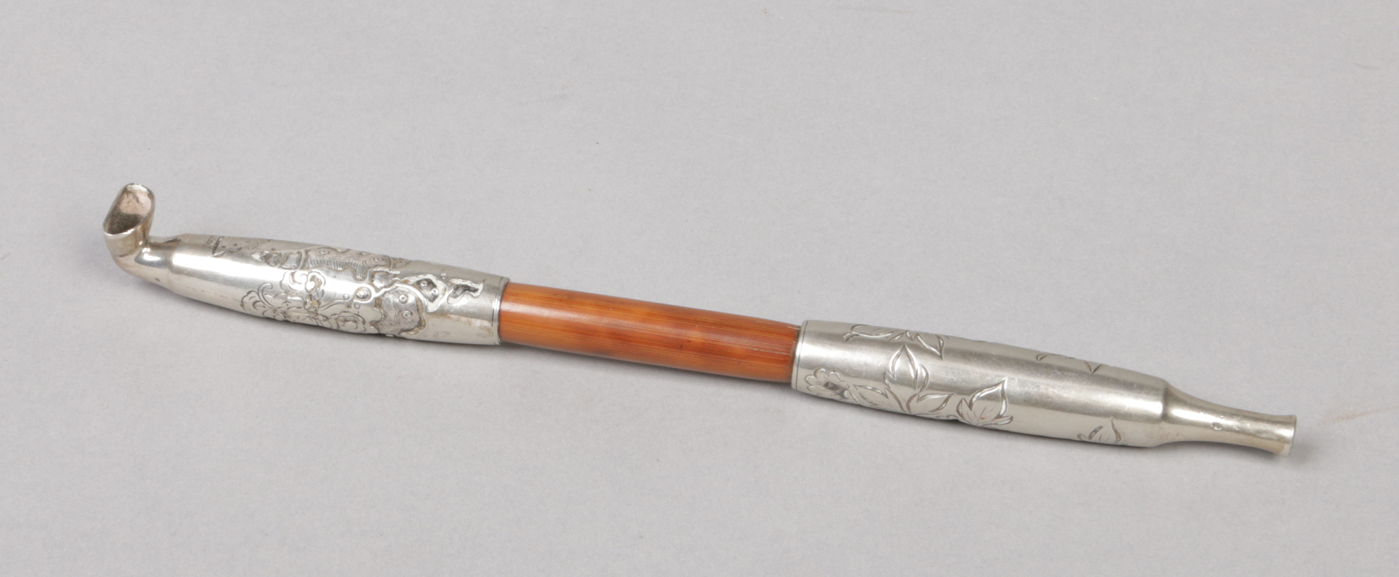 A Chinese silver and bamboo opium pipe, 23cm.