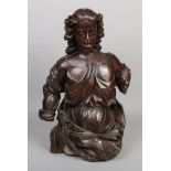 An 18th century Continental carved walnut three quarter length statue of a maiden, 72cm high.