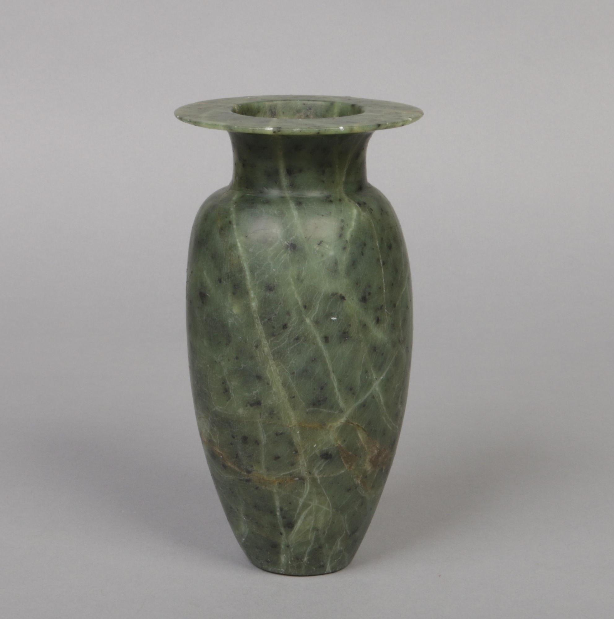 A spinach nephrite vase of ovoid form and with flattened rim, 20.5cm.Condition report intended as