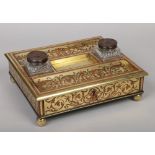A George IV boulle desk stand in the manner of George Bullock. With a pair of cut glass inkwells,