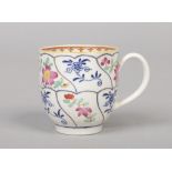 A rare Worcester coffee cup with grooved loop handle. Painted in underglaze blue with the Queen's