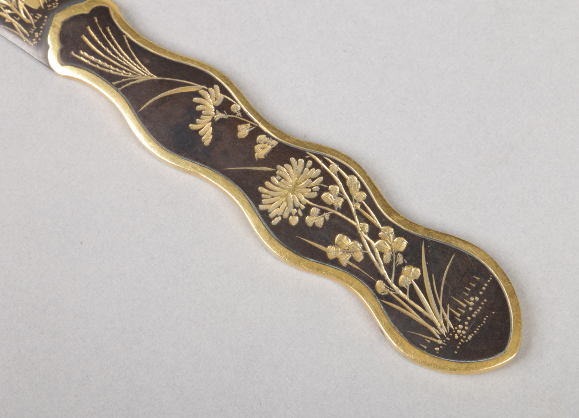 A Japanese bronze paper knife. Engraved with birds and flowers and having gilt embellishments, 22. - Image 6 of 6