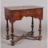 A William & Mary walnut three drawer low boy with bronze pendant handles. With wide crossbanding,