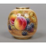 A Royal Worcester globular shaped bud vase by J. Smith. With gilt rims and painted with peaches