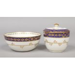 A Caughley Sucrier and cover and matching slop bowl. With wet blue, gilt and enamel borders and with