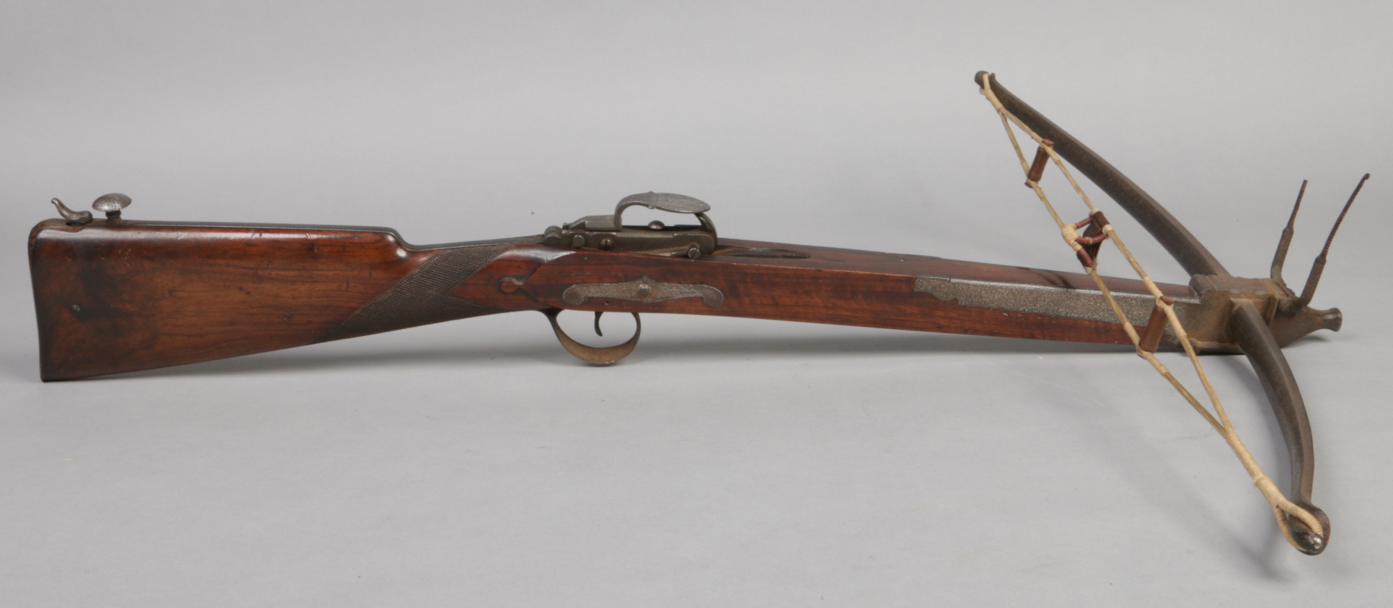 A mid 19th century stone bow, possibly by Barker of Wigan. With carved walnut stock and folding