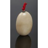 A 19th century Chinese agate snuff bottle, well hollowed and with coral and white metal stopper, 8.