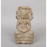 A Ghandara stone statue formed as a seated monk, 32cm.Condition report intended as a guide only.