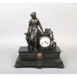 A 19th century French figural slate and spelter mantel clock surmounted by a maiden and raised on