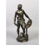A 19th century French bronze sculpture titled Le Travail. The shirtless blacksmith forging a