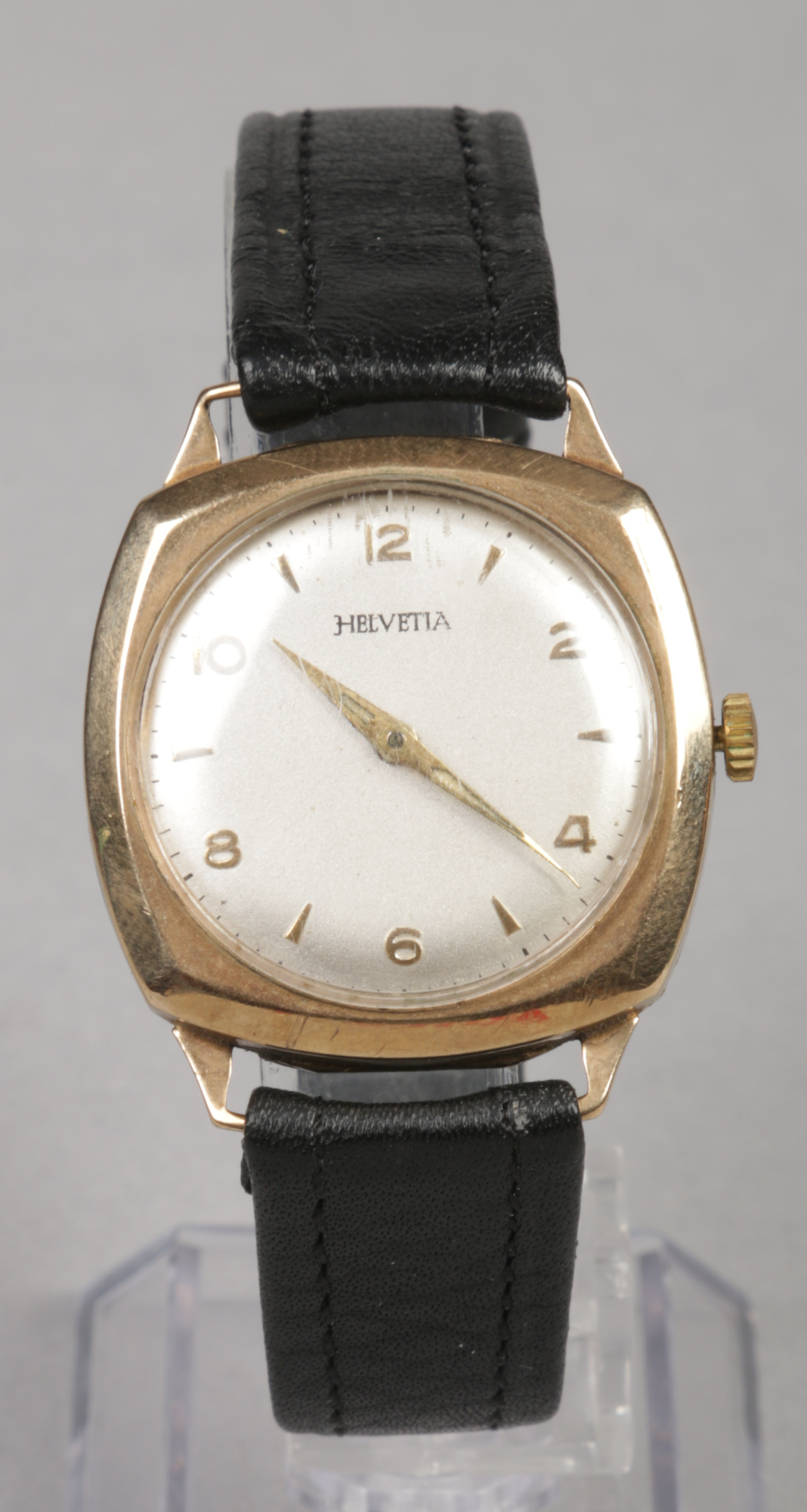 A gentleman's 9ct gold cased Helvetia manual wristwatch. With satin dial having pointed baton and