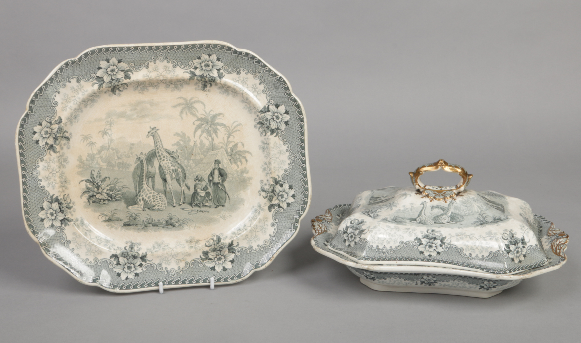 A John Ridgway entree dish and cover and a serving dish. Printed in green and gilded with the