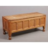 A Robert Thompson Mouseman Yorkshire oak coffer. With pegged two-plank top having adzed finish,