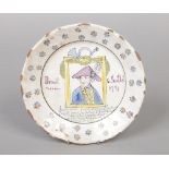 A commemorative French Faience dish. Painted with a portrait and inscribed Drouet Juillet, 1791,