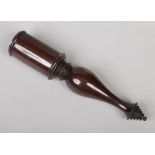 A 19th century turned hardwood tipstaff. With baluster shaped handle and stepped pommel, 18cm.