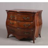 A late 18th / early 19th century kingwood bombe commode. The metamorphic top folding and
