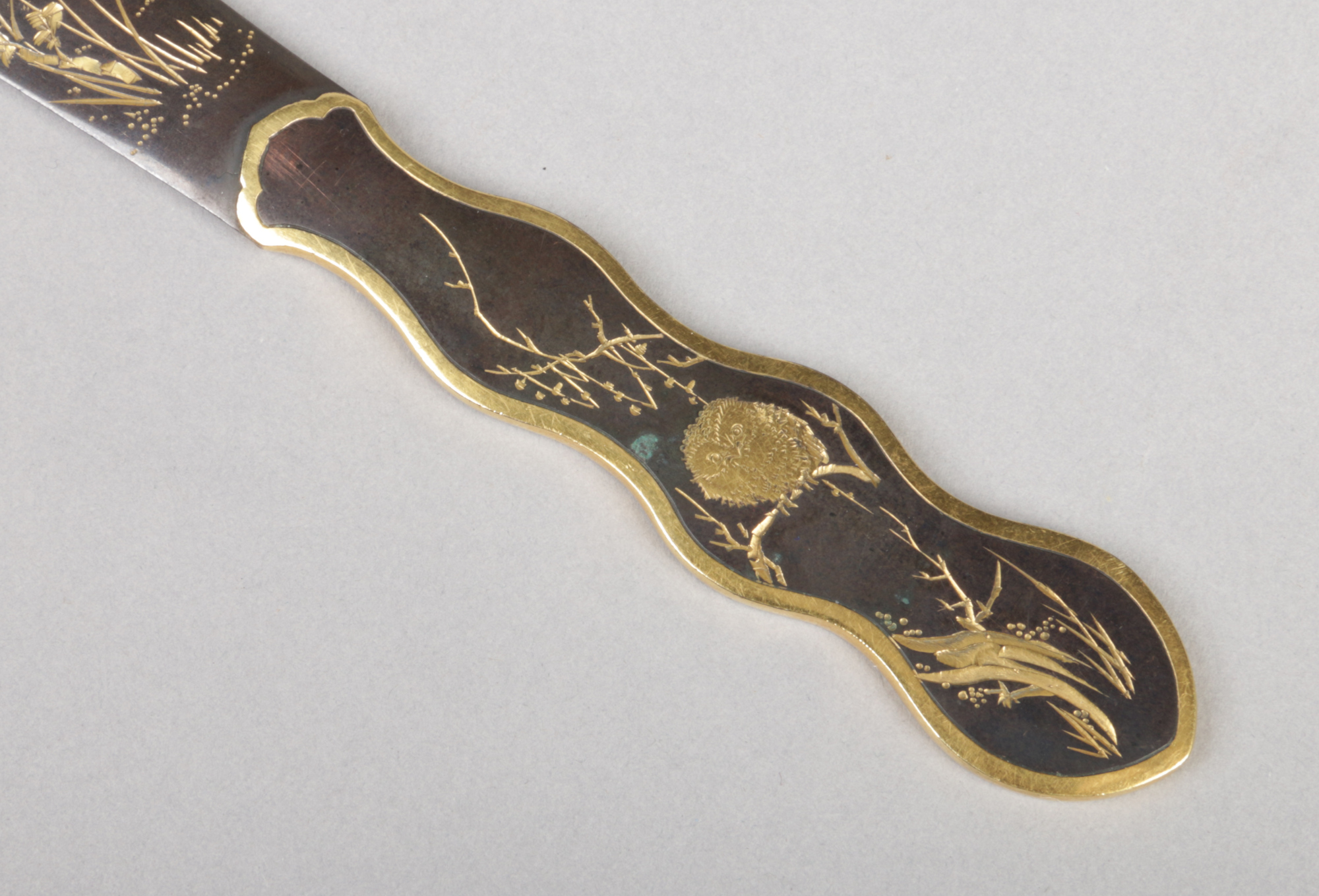 A Japanese bronze paper knife. Engraved with birds and flowers and having gilt embellishments, 22. - Image 2 of 6