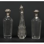 Three 19th century French silver mounted crystal scent bottles. Largest 11cm.Condition report