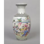 A Chinese Republic period baluster shaped vase. Finely painted in coloured enamels with a Chinese