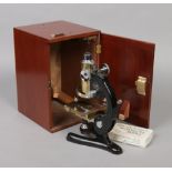 Beck of London model 47 brass and chrome microscope in fitted mahogany case. complete with two