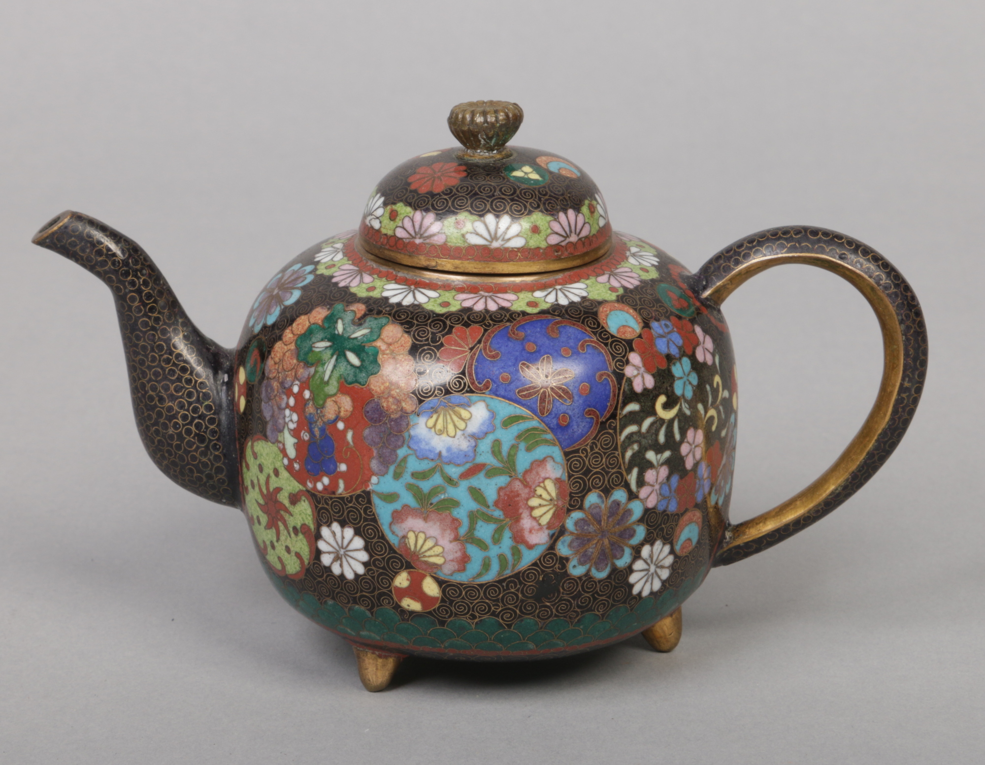 A Japanese Meiji period cloisonne teapot and cover, 9cm.Condition report intended as a guide only.