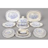 An early 19th century pottery dolls house dinner service. Printed with children playing in