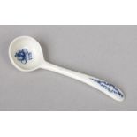 A rare Caughley mustard spoon. Painted in underglaze blue with a flower sprig to the bowl and a