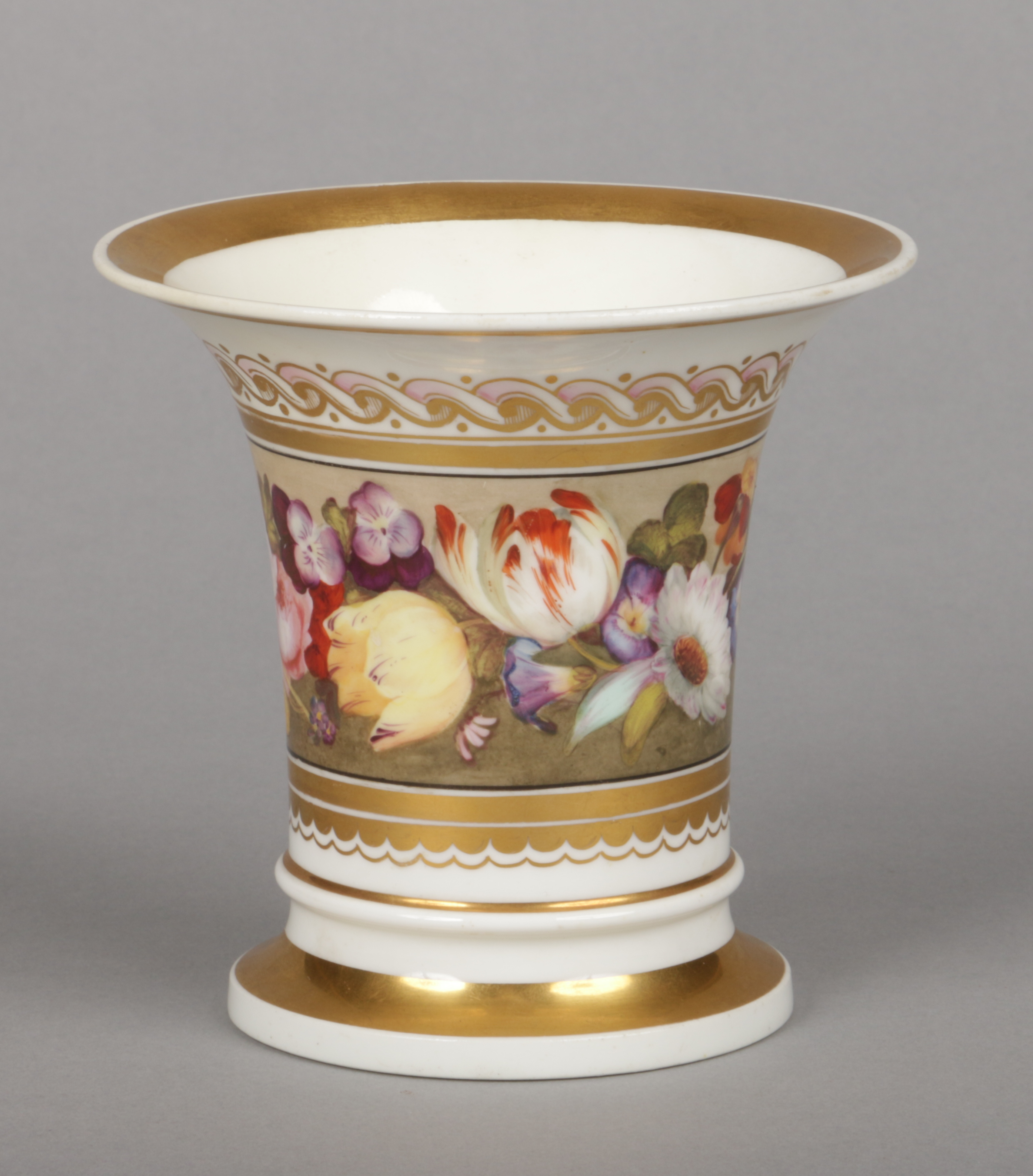 A Rockingham trumpet-shaped vase. With gilt bands and a gilt and pink enamel wave border over a