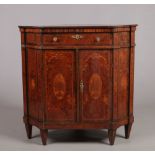 A 19th century bur yew corner cupboard. Crossbanded in rosewood, with a large shell patera to the