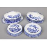 A Ridgeways pottery blue and white dolls house dinner service. Printed with scenes from Charles