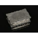 A Victorian silver presentation snuff box by Hilliard & Thomason. With serpentine edge and
