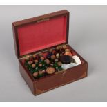 An Edwardian inlaid mahogany domestic medicine box. Fitted and having contemporary and later glass