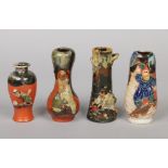 Four Japanese Sumida Gawa bud vases. Decorated with drip glazes and applied figures. One with an