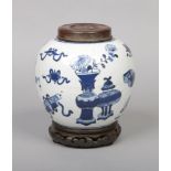 A 19th century Chinese blue and white ginger jar with associated hardwood cover and stand. Painted