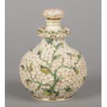 A rare large Rockingham bulbous scent bottle with flower formed stopper. Applied to the entire