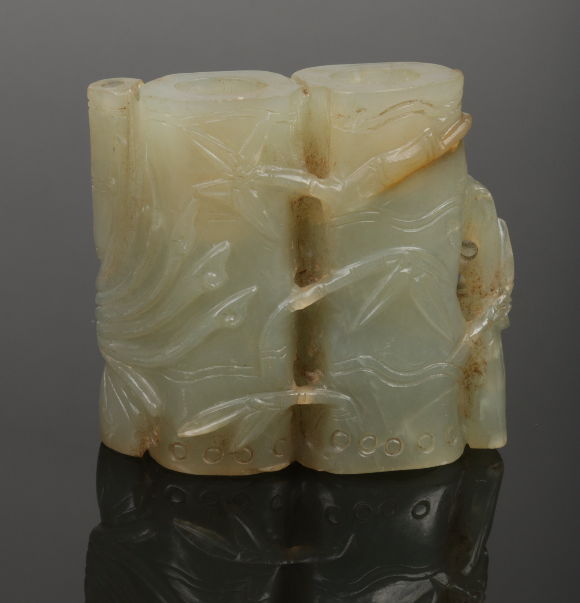 A Chinese celadon jade brush washer. Carved in the form of a bamboo root and with a phoenix - Image 2 of 2