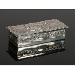 An Edwardian silver box with hinged cover by Goldsmiths & Silversmiths Co. Ltd. Embossed with a