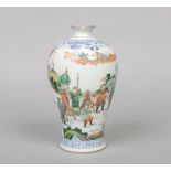A Chinese famille verte meiping vase. Painted with an underglaze blue lambrequin collar and with a