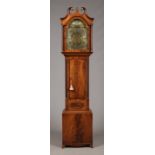A George III figured mahogany 8 day longcase clock by John Hamilton, Glasgow. With brass arch top