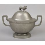 A 19th century Continental pewter soup tureen of ovoid form and with statant lion finial, 48cm wide.